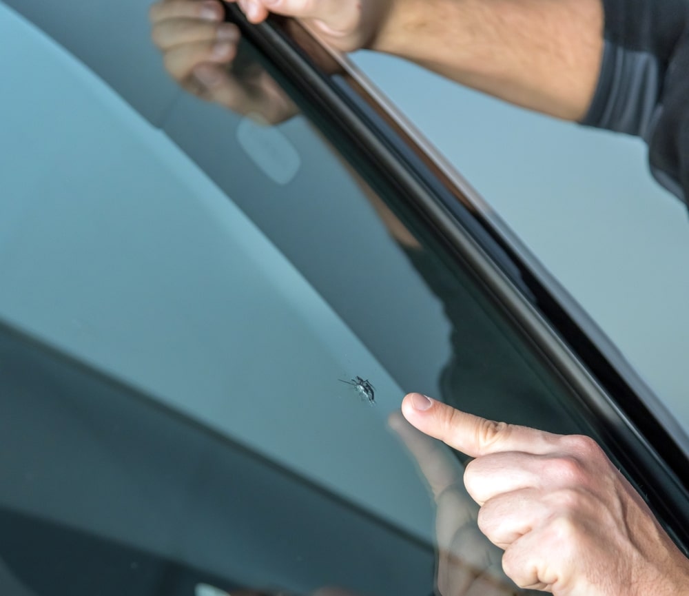 A chip in a windshield - The Importance of Using High-Quality Materials in Auto Glass Repairs
