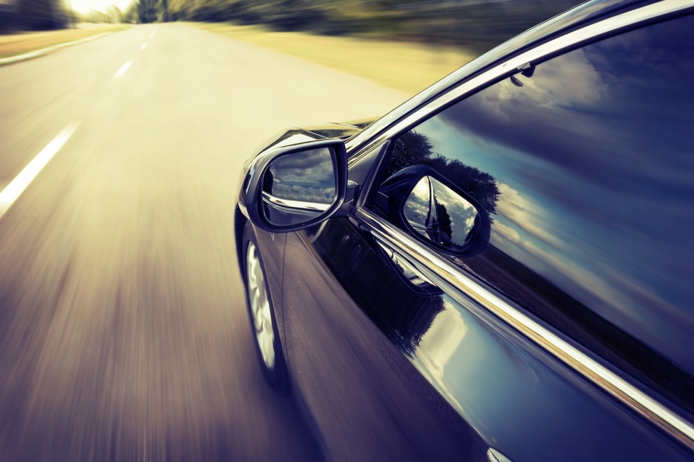 a car on the road - Choosing the Best Local Solution for Your Auto Glass Needs
