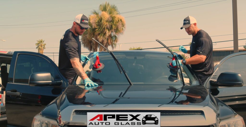 APEX auto glass technicians repairing a windshield - Auto Glass Repair Services in New Orleans
