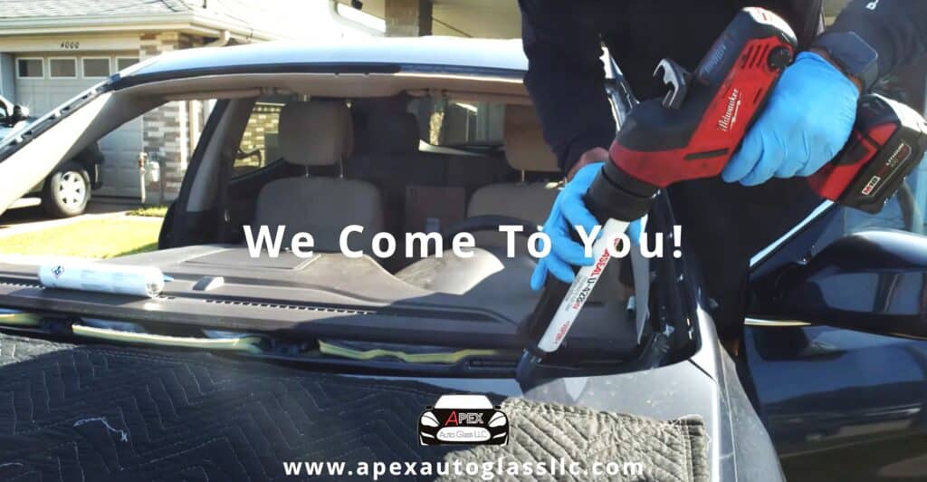apex auto glass technician doing mobile windshield replacement, showcasing the high-quality mobile auto glass repair services available in New Orleans.